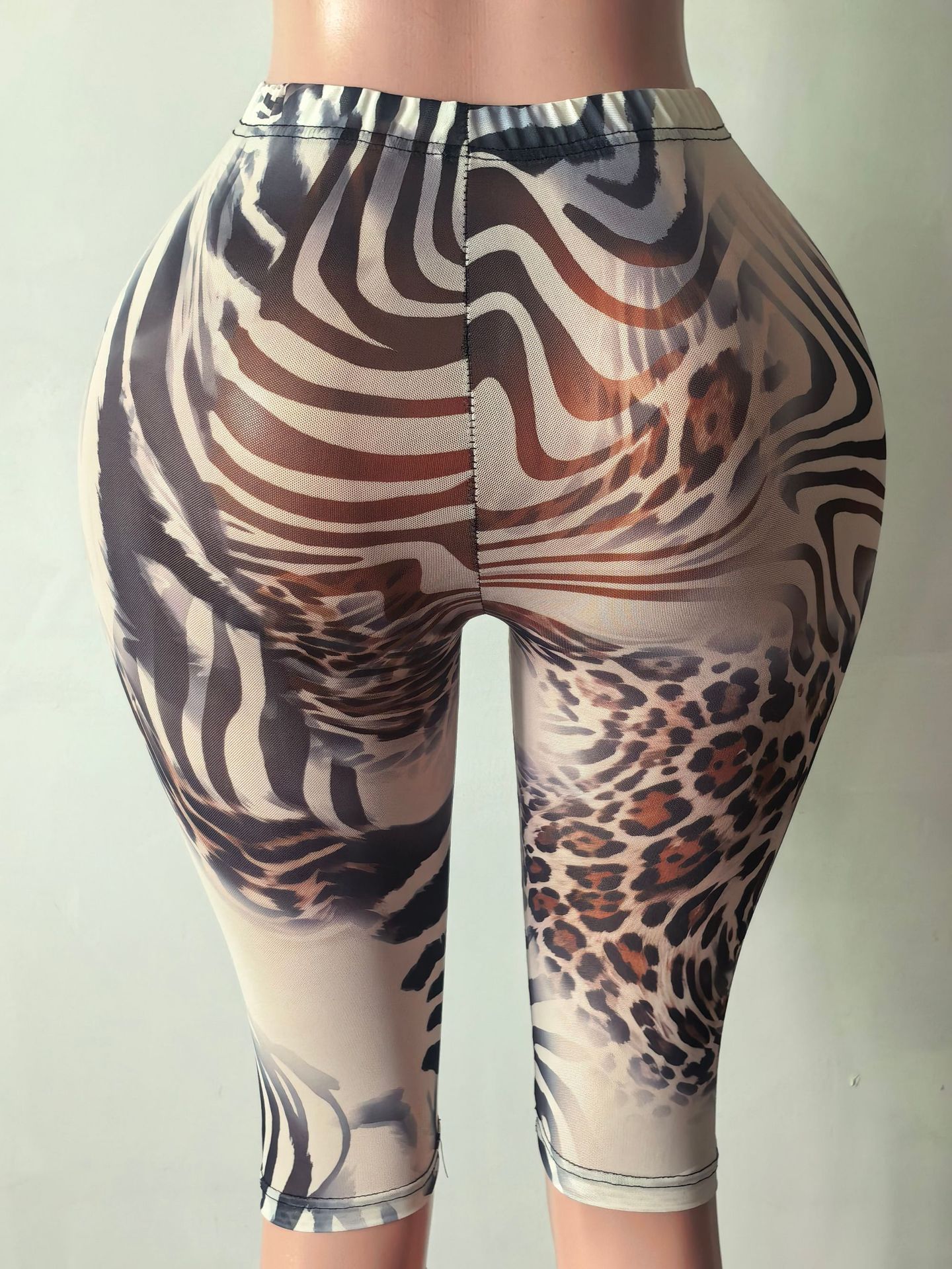 Stylowe damskie spodnie capri  – Zebra Tablet Accessories recenzja i cena